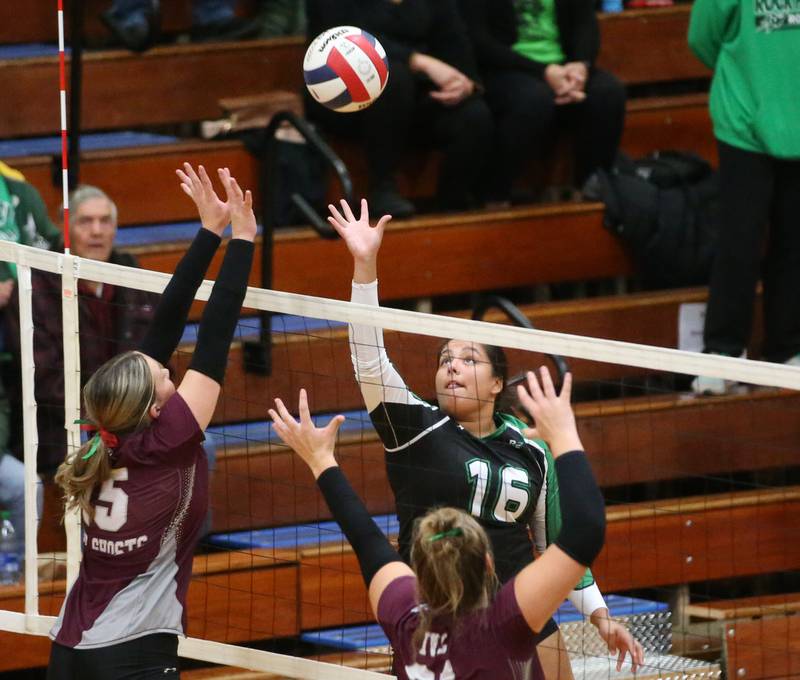 Rock Falls's Taylor Reyna sends the ball past Illinois Valley Central's Sage Geltmaker and teammate Lizzy Short during the Class 2A Sectional final game on Wednesday, Nov. 1, 2023 at Princeton High School.