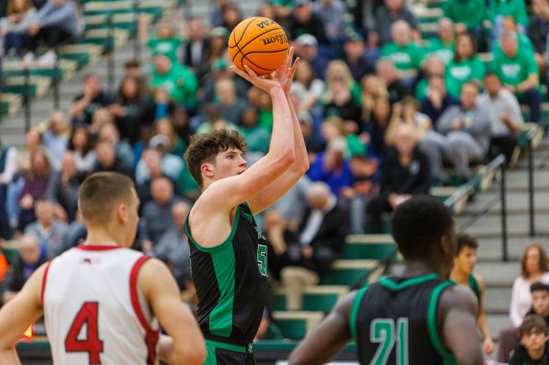 York's Hunter Stepanich shoots a clutch free throw against Glenbard East in the forth quarter at the Class 4A Bartlett Sectional Final on Friday, March 6,2026 in Bartlett.