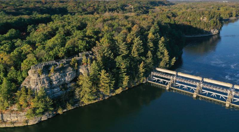Trees begin to turn color on Thursday, Oct. 23, 2025 near Lovers Leap at Starved Rock State Park. The fall colors have been late this season due to the dry drought conditions and warmer temperatures.