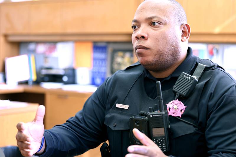 Josef Gordon, DeKalb Police officer and student resource officer at DeKalb High School, talks Thursday, Oct. 20, 2022, at the school, about what he enjoys most about working with students and some of the challenges that it can create.