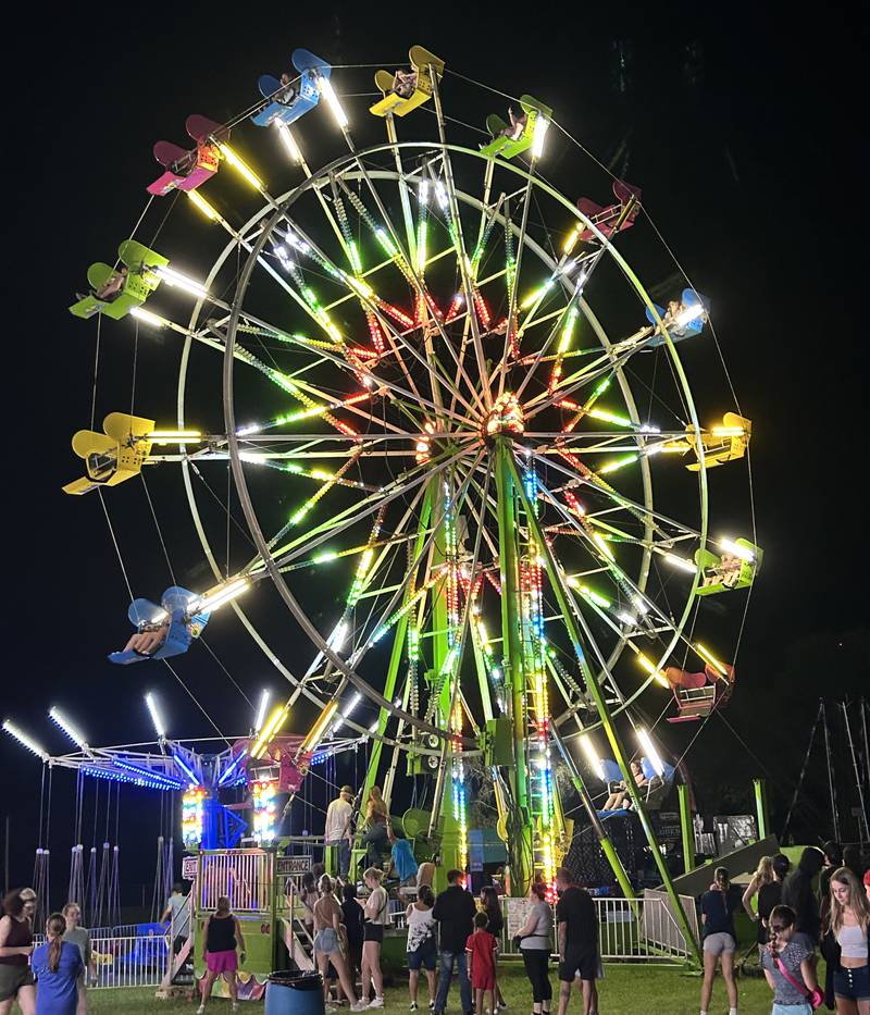 The ferris wheel gave riders a birds eye view of the Ogle County Fair on Thursday night, Aug. 1, 2024.