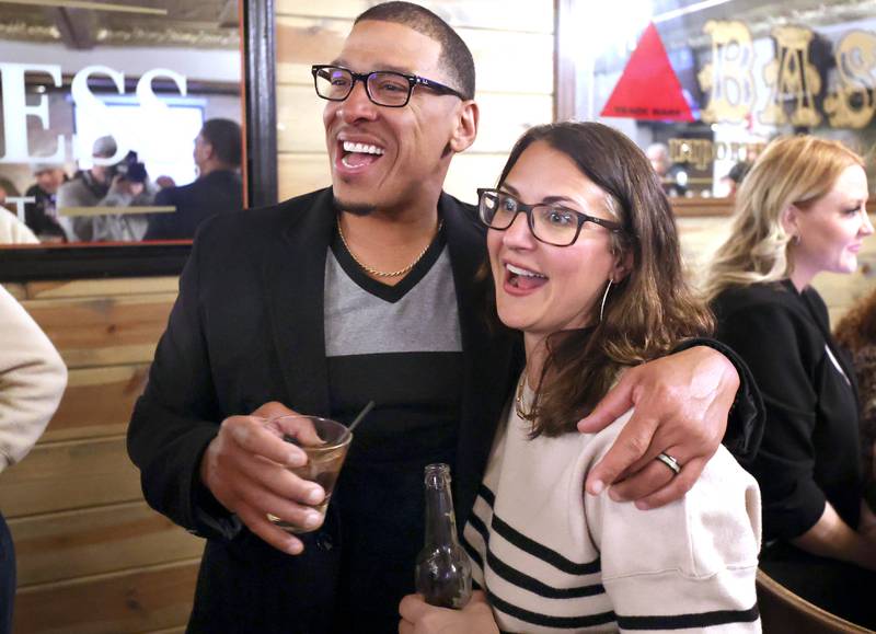 John Walker, DeKalb 7th Ward aldermanic candidate, and his wife Amy say hi to a supporter Tuesday, April 4, 2023, during an election night watch party at Fatty's Pub & Grill in DeKalb.