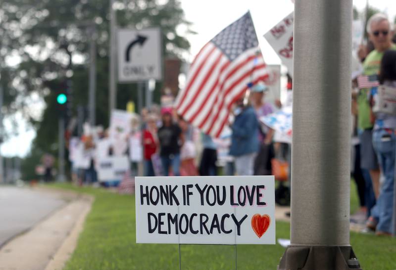Crowds gathered for the “Good Trouble Lives On” protest along Route 14 in Crystal Lake on Thursday, July 17, 2025.