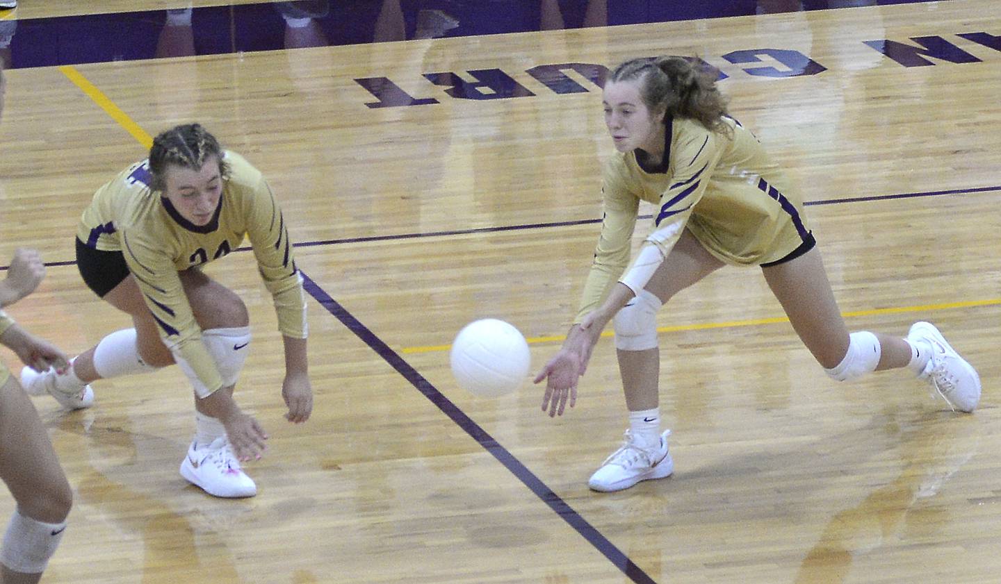 Serena’s Maddie Glade and Macy Mahler converge while diving for a spike in the 2nd game Thursday at Serena against Hall.