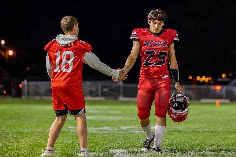 Hall teammates high five after loss on Friday, Sept 5, 2025 at Richard Nesti Stadium in Spring Valley.