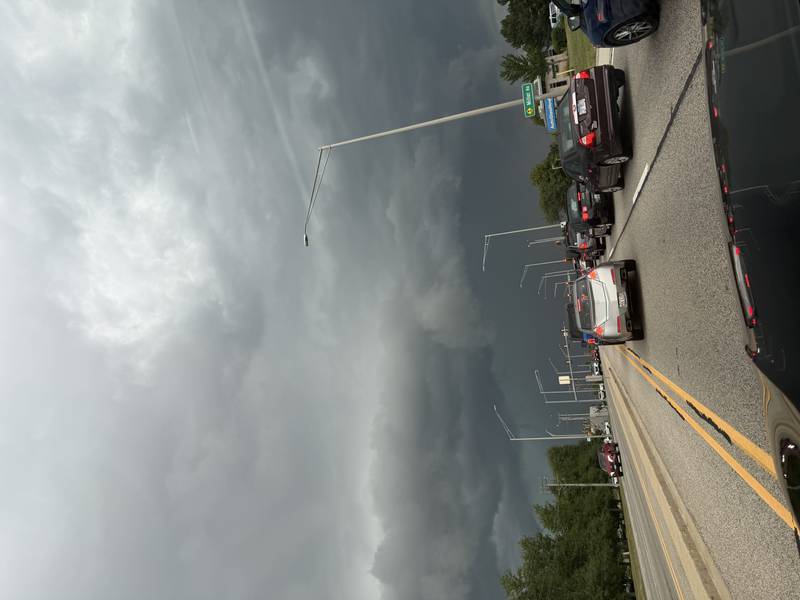 Dark clouds fill the sky on Aug. 16, 2025, above the corner of Randall and Huntley roads in Carpentersville.