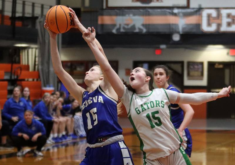 Crystal Lake South’s Tessa Melhuish, right, battles Geneva’s Emma Peterson for the ball in girls IHSA Class 3A Sectional Championship basketball on Thursday, Feb. 26, 2026, at Crystal Lake Central High School in Crystal Lake.