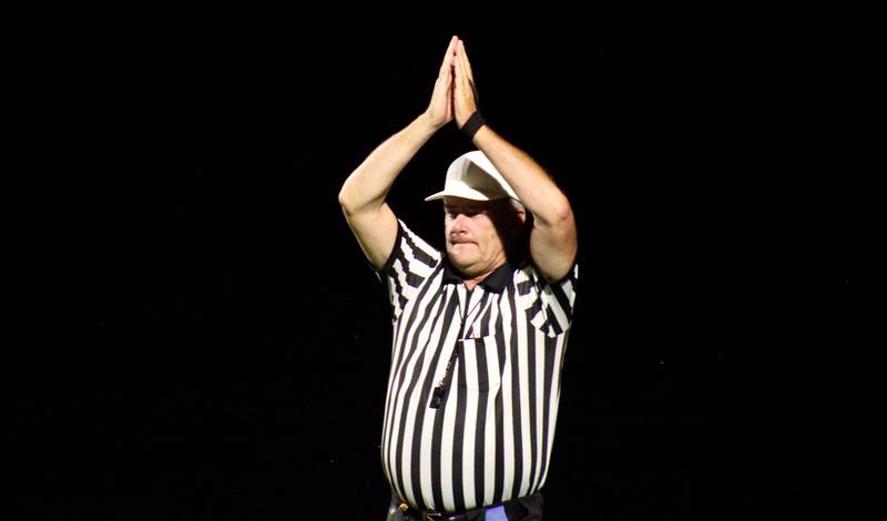 An official signals a safety after Rock Falls is tackled in the end zone in the third period.