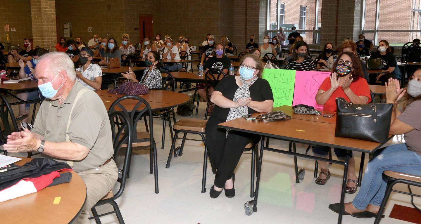 The July 26, 2021 Kaneland School Board Meeting drew a large crowd at Kaneland Harter Middle School in Sugar Grove.