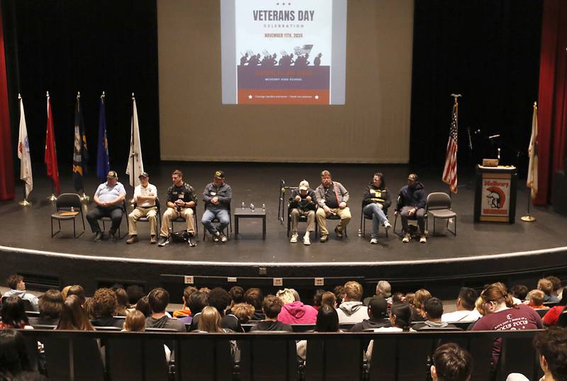 Students listen as some of the more than 10 local veterans talk about their experiences in military service during a Veterans Day panel discussion on Monday, Nov. 11, 2024, at Upper Campus of McHenry High School. “It is always a special day when we welcome our veterans to our buildings to talk about their experiences,” said Sean Sterner, chair of McHenry High School’s social science division which organized the event.