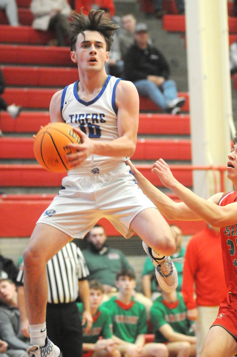 Princeton's Gavin Lanham grabs some air while playing offense against La Salle-Peru on Friday, Nov. 29. 2024, at Kingman Gym.