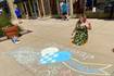 Geneva businesses create Swedish Days chalk art 