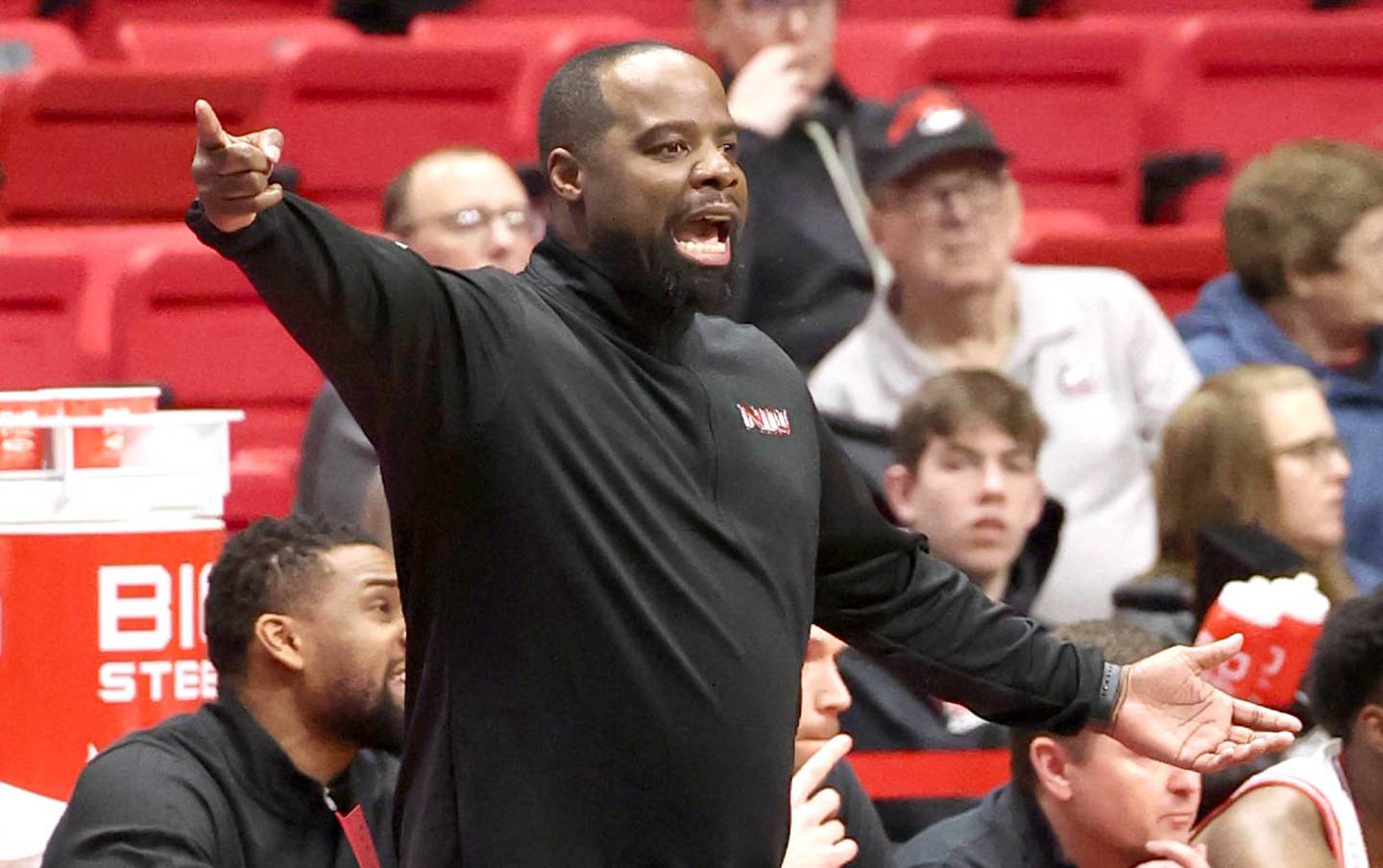 Northern Illinois Huskies head coach Rashon Burno talks to his team Tuesday, Feb. 28, 2023, during their conference matchup against Buffalo at the Convocation Center at NIU.