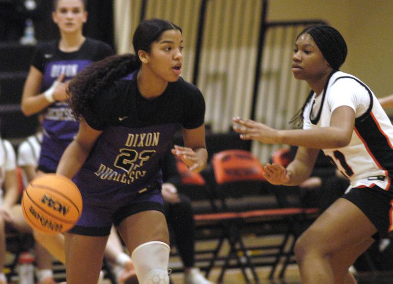 Dixon's Ahmyrie McGowan brings the ball up defended by Byron's Malia Morton. The Byron Tigers won over the Dixon Duchesses 46-43 in overtime. The girls basketball game took place at Byron on Saturday, January 24th, 2026.