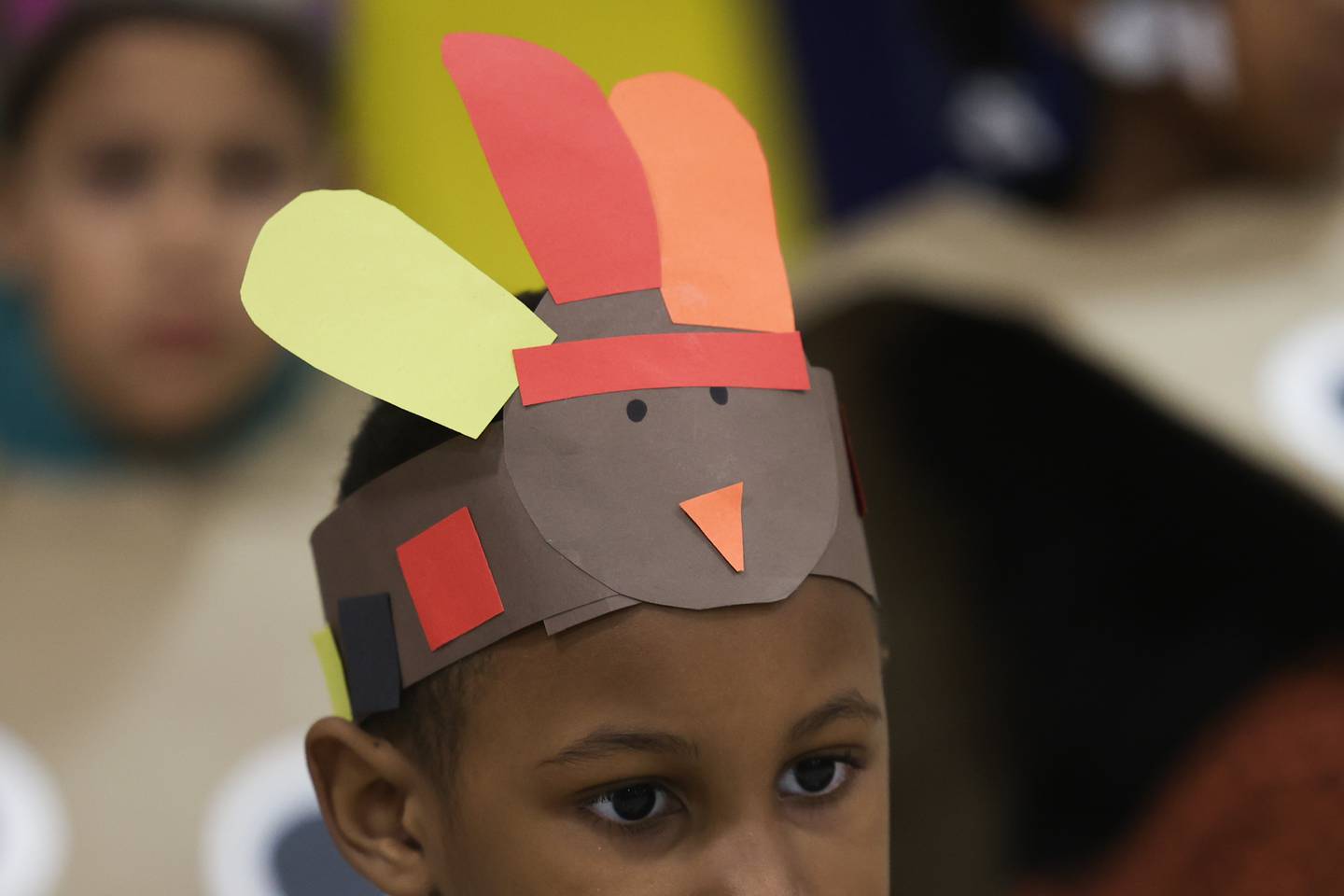 Kindergartener Victor Beaman wears his crafted hat during a Thanksgiving gathering at Thomas Jefferson Elementary School in Joliet on Friday.