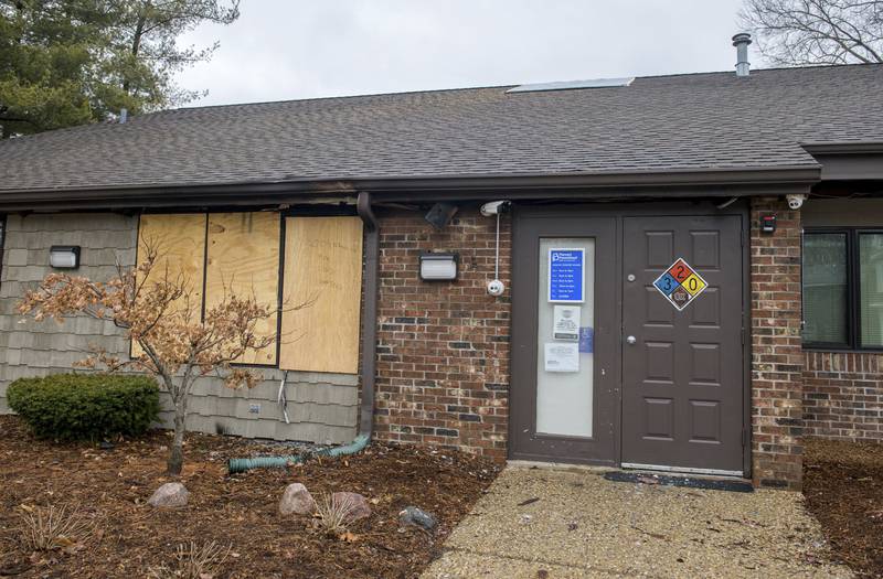 FILE- A front window is boarded up at the Planned Parenthood Health Center at 2709 Knoxville Avenue in Peoria, Ill., on Monday, Jan. 16, 2023. Tyler W. Massengill of Chillicothe, Ill. pleaded guilty Thursday, Feb 16, 2023, to “malicious use of fire” to damage the Planned Parenthood clinic last month, federal law enforcement said.