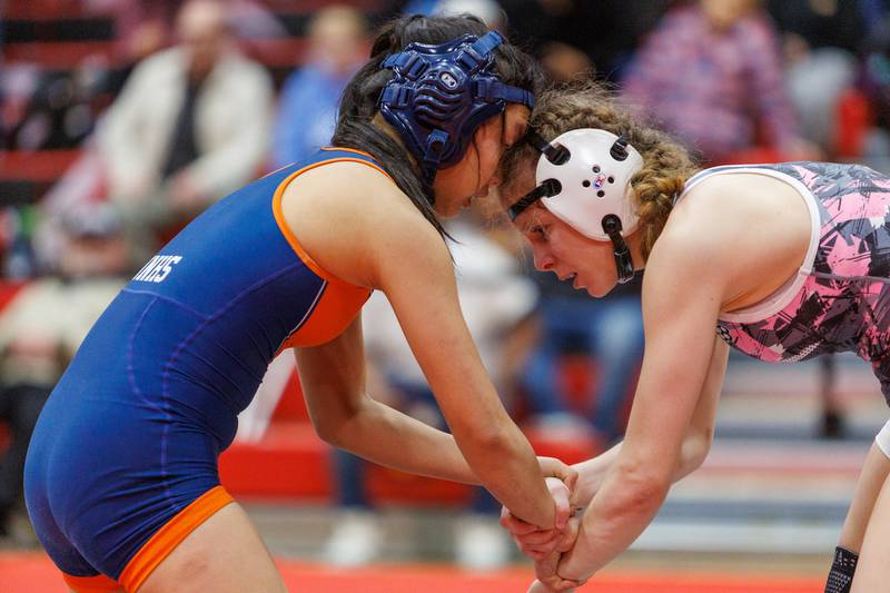Naperville North's Keyi Wang and Lincoln Way South's Emmy Hoselton compete in the championship 105 lb class at the East Aurora Wrestling Regional on Saturday, Feb.7,2026 in Aurora.