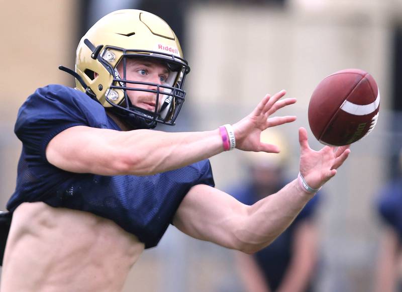 Hiawatha’s Lucas Norvell makes a catch during practice Wednesday, August 9, 2023, at the school in Kirkland.