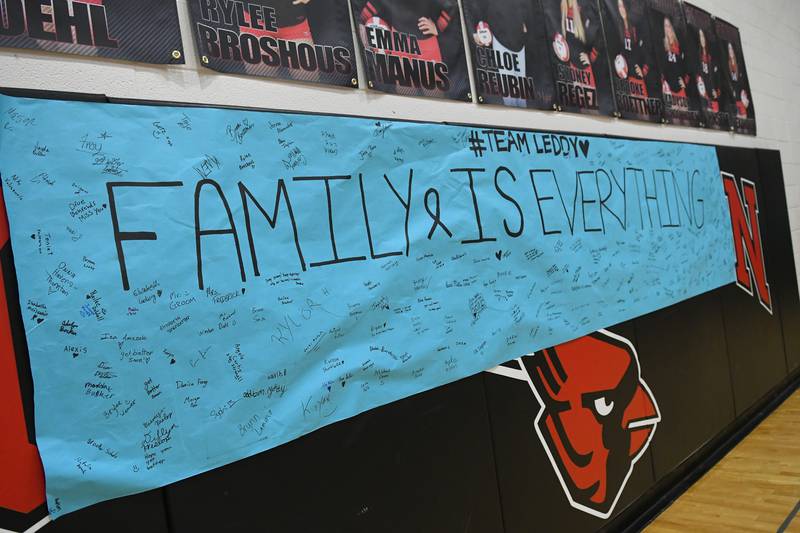 Signatures filled the "Team Leddy Family is Everything" banner that was displayed during the Volley for the Cure game in Forreston on Tuesday, Sept. 27. Leddy, a teacher in the Forrestville Valley School District who is a native of Milledgeville, is battling cancer. Tuesday night's event included a slient auction, bake sale, and t-shirt sales to aid her in her battle.