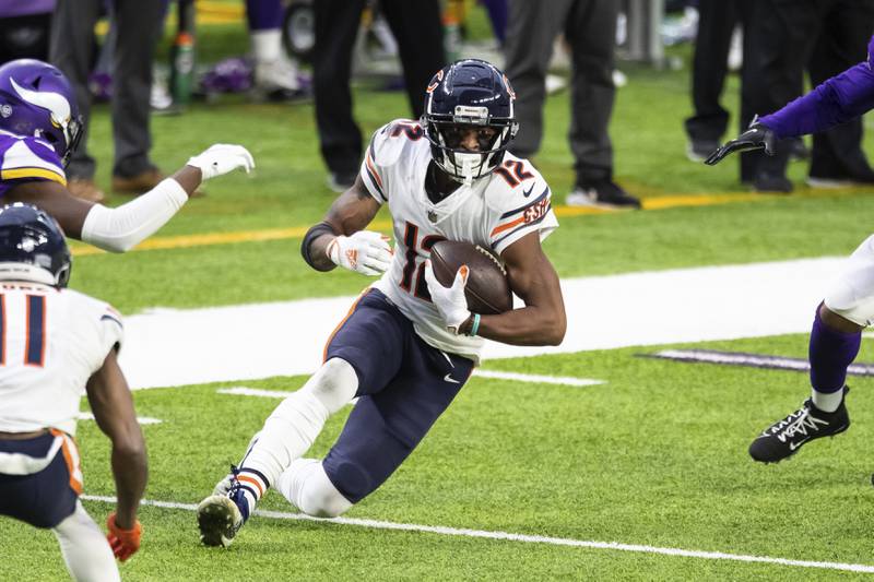 Chicago Bears wide receiver Allen Robinson (12) runs with the ball in the fourth quarter during an NFL football game against the Minnesota Vikings, Sunday, Dec. 20, 2020, in Minneapolis. The Bears defeated the Vikings 33-27. (AP Photo/David Berding)