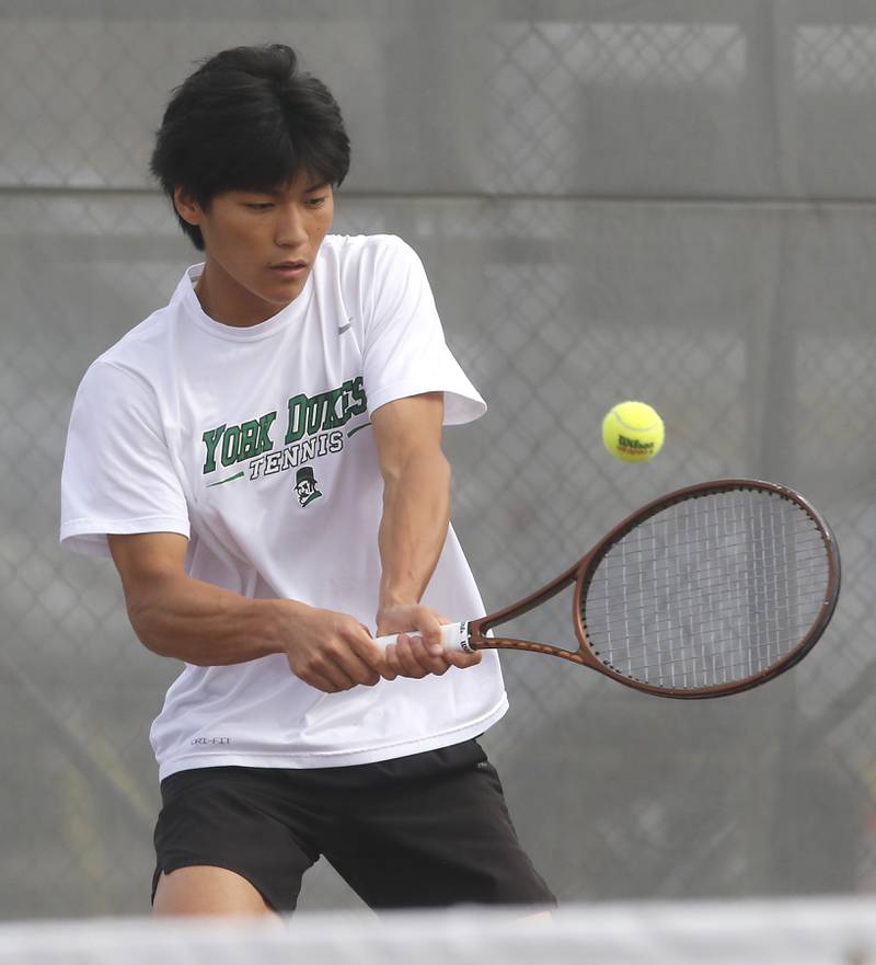 York’s Nate Yu returns the ball as he and his doubles partner, Brennen Maxeiner, compete in the Class 2A Boys State Tennis Tournament on Thursday, May 29, 2025, at Palatine High School.
