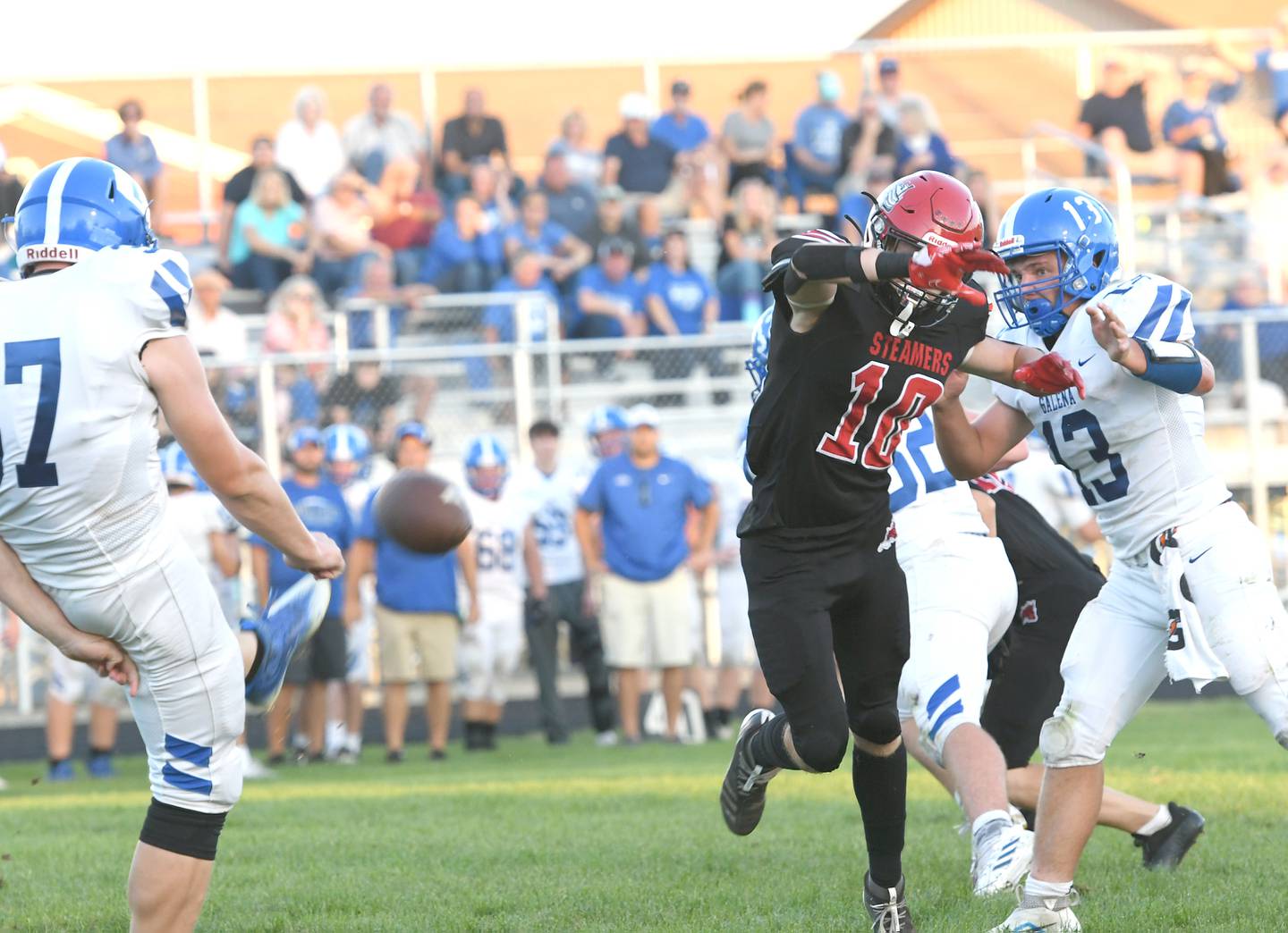 Fulton's Conner Sheridan tries to block a punt against Galena on Friday, Aug. 26, 2022.