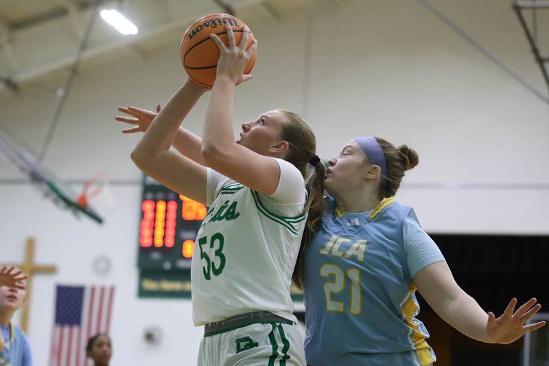 Providence’s Landrie Callahan draws the foul on a shot against Joliet Catholic on Saturday, Dec. 5, 2025 in New Lenox.