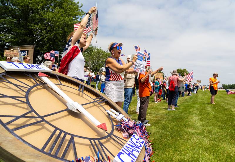 Protesters gather on South Randall Road for a “No Kings Day” Protest against President Donald Trump’s policies along South Randall Road in Geneva on Saturday, June 14, 2025.