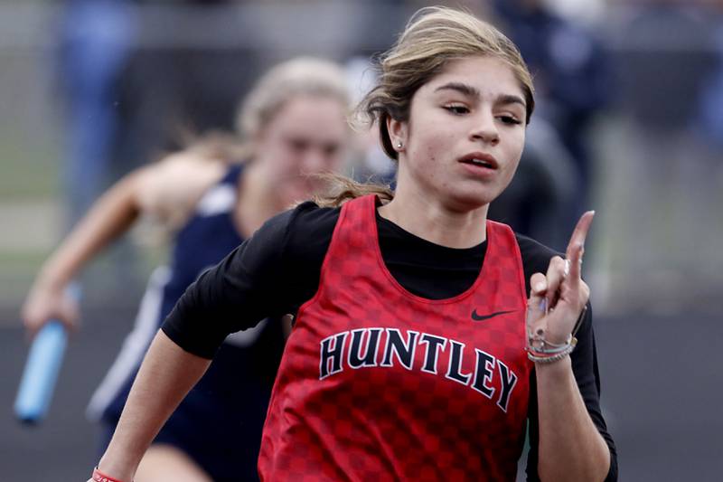 Huntley’s Vicky Evtimov fires out of the blocks as she runs the first leg of the 4 x 100 meter relay during Fox Valley Conference girls track and field meet Friday, May 6, 2022, at Hampshire High School.