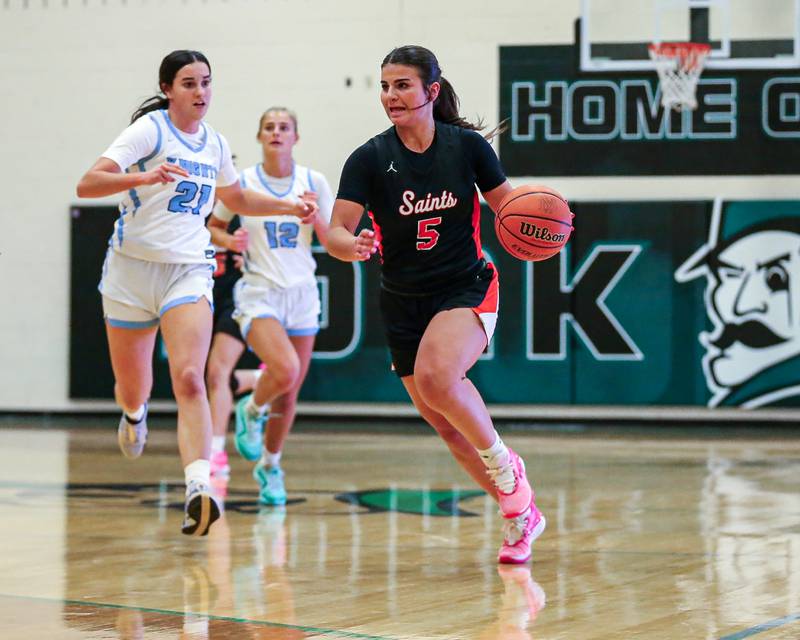 St Charles East's Lexi DiOrio (5) races down the court at the York Thanksgiving Tournament. Nov 13, 2023.