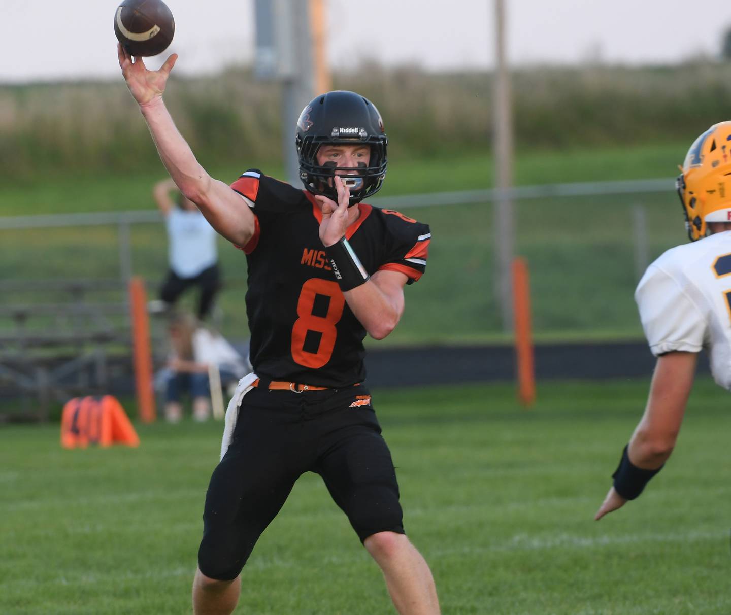 Milledgeville quarterback Connor Nye passes against Freeport Aquin.