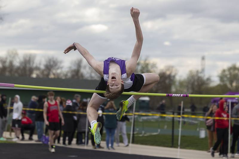 Dixon’s Ethan Hays clears the bar in the high jump Friday, April 21, 2023 at the Rock Falls Rocket Invitational.