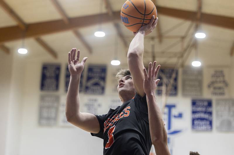 Milledgeville’s Konner Johnson puts up a shot against Newman Monday, Feb. 24, 2025, during a Class 1A Regional quarterfinal at Newman High School.