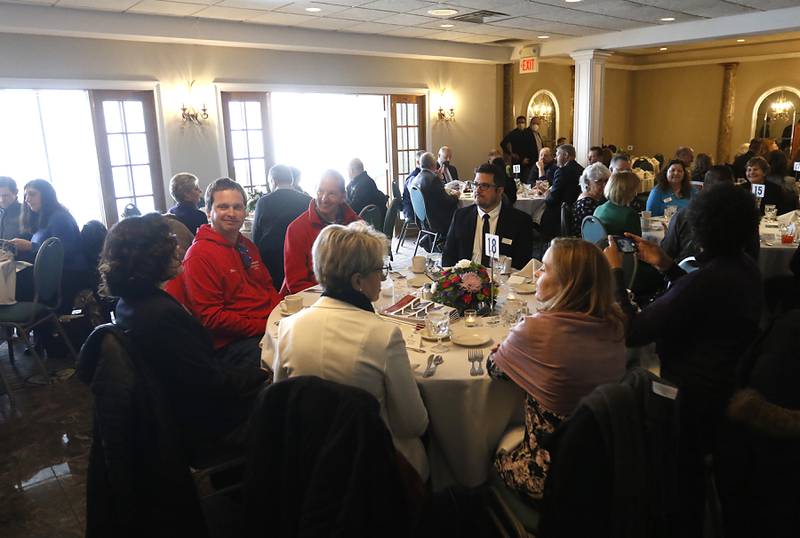 People talk as they wait for lunch to be served during the Crystal Lake Chamber of Commerce’s State of the Community Luncheon, Friday, Feb. 4, 2022, at D'Andrea Banquets & Conference Center. The annual luncheon feature guest speakers Crystal Lake Mayor Haig Haleblian and Village of Lakewood President David Stavropoulos who spoke about their respective communities.