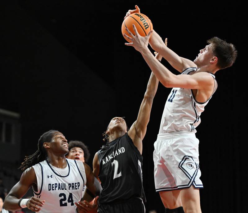 DePaul College Prep's Jonas Johnson, right, grabs a rebound next to Kaneland's Isaiah Gipson, middle, and teammate Rashaun Porter during the Class 3A boys supersectional at NOW Arena on Monday, March 10, 2025 in Hoffman Estates.