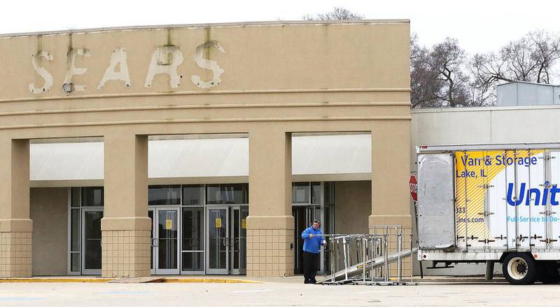 A worker from ADCO Van and Storage loads fixtures on Tuesday from the former Sears store at 105 Northwest Highway in Crystal Lake. Demolition of the former Sears property will begin in a few weeks as Mariano’s prepares its entry to the Crystal Lake marketplace.