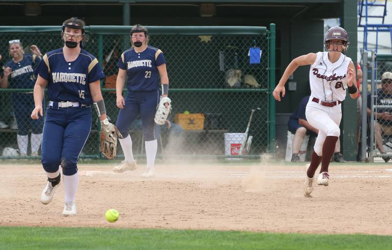 Marquette's Makayla Backos watches the ball pass by into center field as LeRoy's Emma Bagnell runs to second base during the Class 1A Supersectional game on Monday, May 29, 2023 at Illinois Wesleyan University in Bloomington.