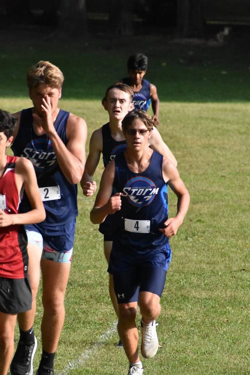 Bureau Valley's Andrew Roth (4), Landon Hulsing (2) and Nathan Siri race to the finish line in Tuesday's quad at Walnut.
