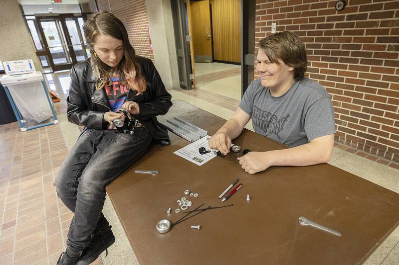 Prophetstown students Ozzy Tillman (left) and Ronan Schiefelbein work on their car Friday, April 26, 2024. Local businesses P&P, Walmart Distribution, Franz, Raynor, Donaldson, F.N. Smith, UPM, Astec, and Crest Foods participated in Manufacturing Day.