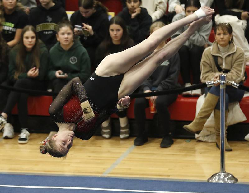 Mundelein’s Lexie Ede competes in the preliminary round of the floor exercise  on Friday, Feb. 20, 2026, during the IHSA Girls State Final Gymnastics Meet at Palatine High School.