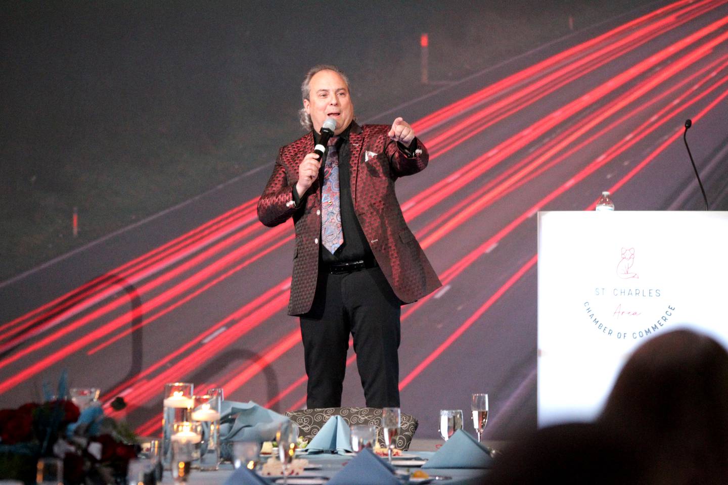 Ron Onesti, president and founder of Onesti Entertainment, serves as the emcee of the 55th Annual Charlemagne Awards Dinner at the Q Center in St. Charles on Friday, May 19, 2023.