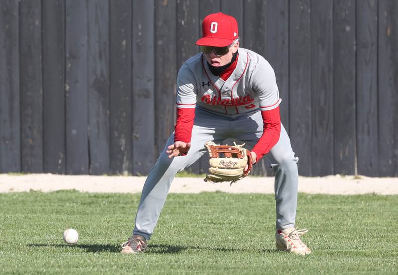 Ottawa's Jaxon Cooper fields a ball in the outfield during their game against Sycamore Friday, April 19, 2024, at the Sycamore Community Sports Complex.