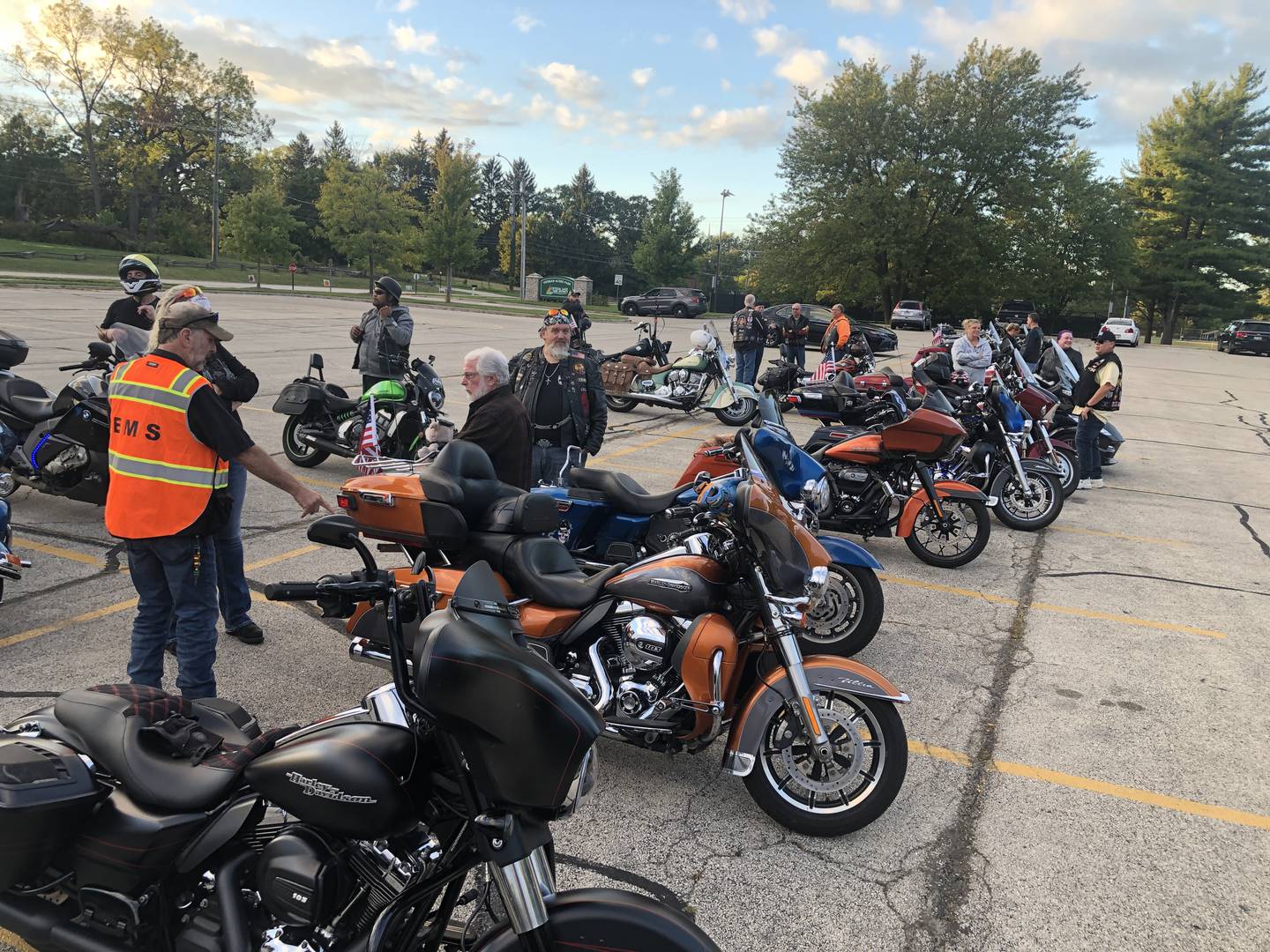 Bikers, including military veterans and civilian supporters, lined up on Sunday, Sept. 29, 2024, at Veteran's Acres Park in Crystal Lake, before driving to WW2 veteran Lorraine Egan's home to celebrate her 102nd birthday.