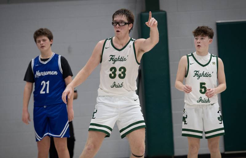 Bishop McNamara's Callaghan O'Connor, center, gestures after a foul in a game against Newark on Friday, Feb. 20, 2026.