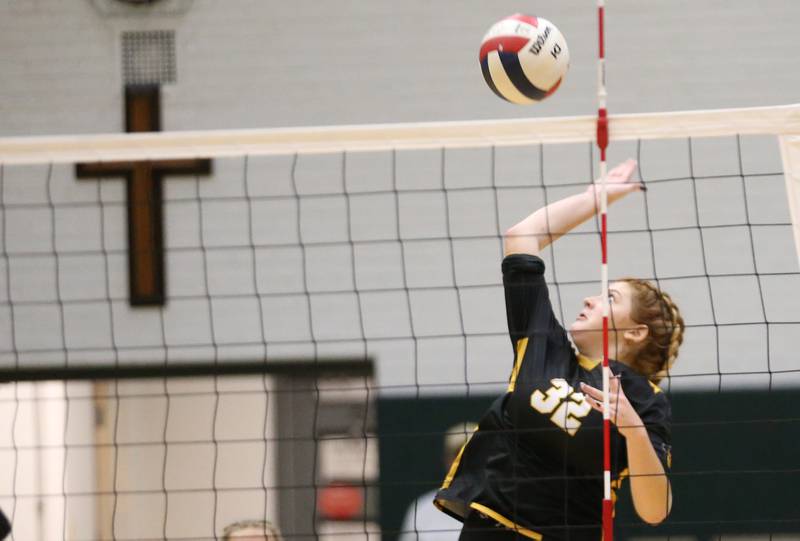 Putnam County's Maggie Spratt sends the ball over to the St. Bede side of the net on Tuesday, Sept. 24, 2024 at St. Bede Academy.