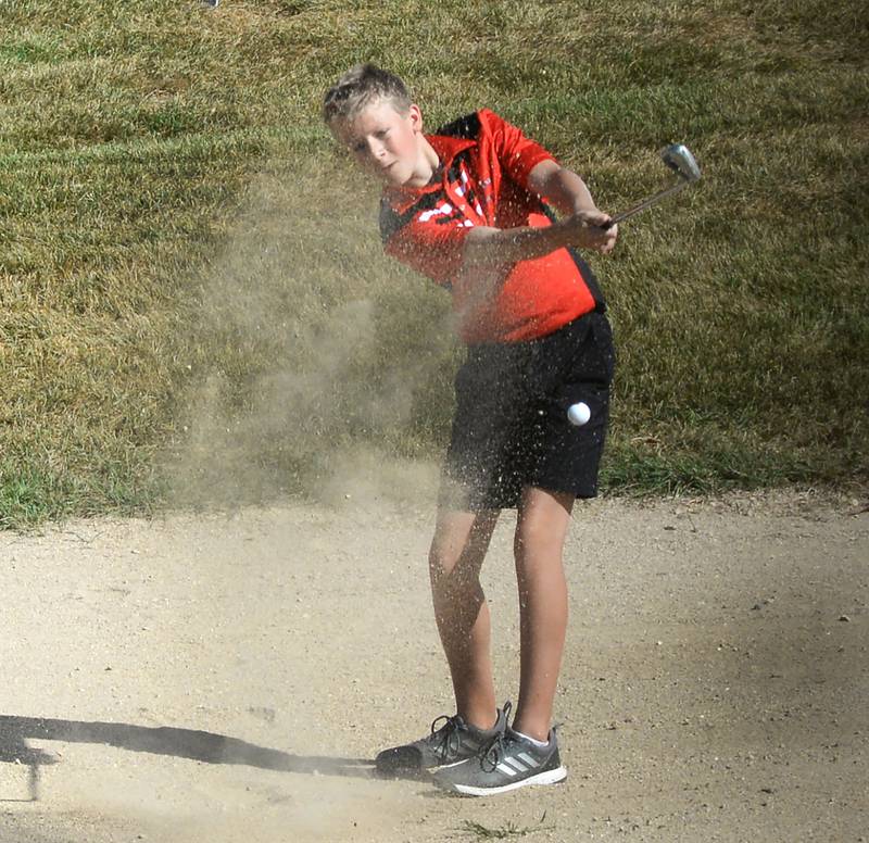 Forreston's Brayden Pauls hits out of a sand trap at Wolf Hollow Golf Course in Lena during the 1A Pearl City Regional on Wednesday, Oct. 1, 2025.
