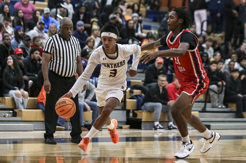 Oswego's Ethan Vahl (3) drives past the defense during their basketball game between West Aurora at Oswego Monday, Nov 24, 2025 in Oswego.