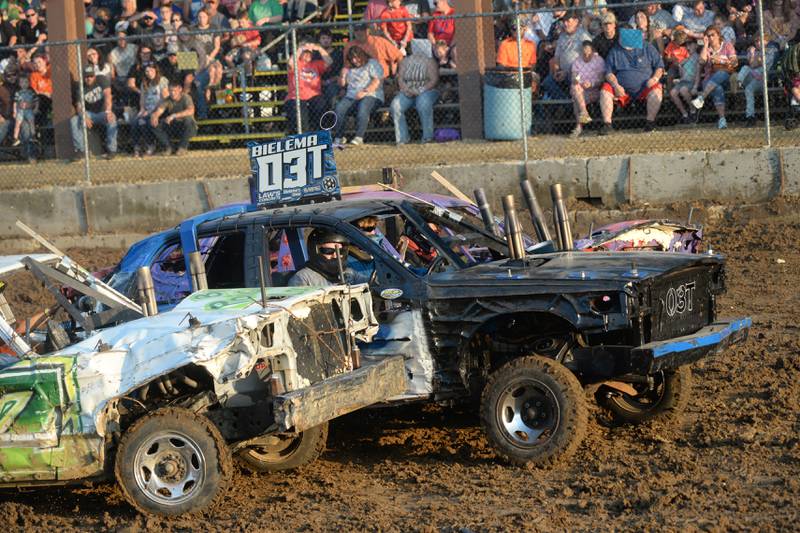 Tyler Bielema of Sterling drives his )3T demo car at the Ogle County Fair on Saturday, Aug. 5, 2023. His 1999 Crown Victoria won the Young Guns heat.