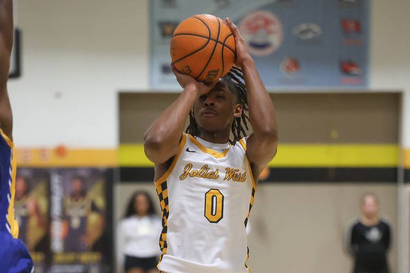 Joliet West’s Aamir Shannon puts up the outside shot against Joliet Central on Tuesday, Feb. 17, 2026 in Joliet.
