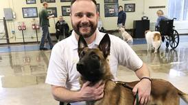 Lawsuit claims Lake County coroner blacklisted former employee who kept office cadaver dog